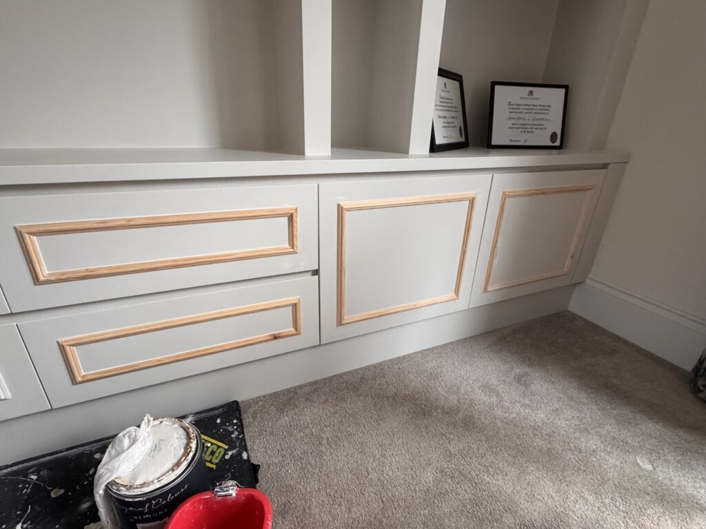 Built-in cabinets filled and prepared ready for painting