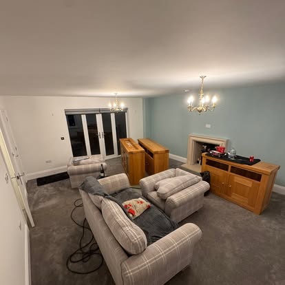Living room with duck-egg walls and white woodwork