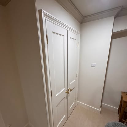 White painted panelled double wardrobe doors