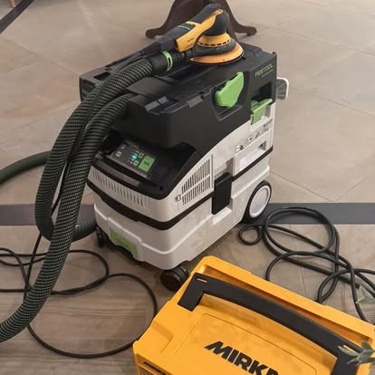 Festool dust extractor and Mirka sander used for dust-free prep