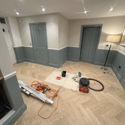 Hallway with half-height panelling in blue-grey