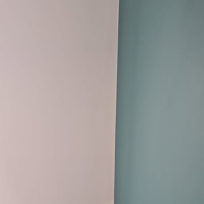 Wall painted in deep teal